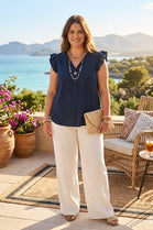 OVERSIZED FLUTTER SLEEVE TOP