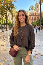 BUTTON-SLEEVE OVERSIZED SWEATSHIRT