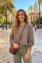 BUTTON-SLEEVE OVERSIZED SWEATSHIRT