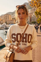 SOHO LEATHER PATCH SLOGAN JUMPER