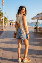 HIGHNECK BACKLESS BOW BLOUSE
