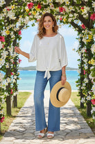 TEXTURED FRONT TIE OVERSIZED BLOUSE