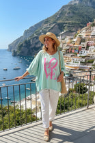 DO IT WITH LOVE SLOGAN OVERSIZED TOP