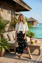 PLEATED POLKA DOT SKIRT