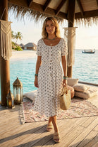 POLKA DOT SMOCKED MIDI DRESS