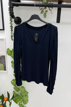 GOLD BUTTON LONG SLEEVE V-NECK JERSEY TOP