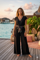 V-NECK BELTED GAUZE JUMPSUIT