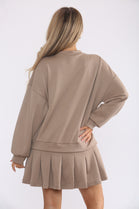 PLEATED BOTTOM JUMPER DRESS