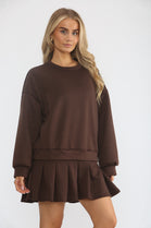 PLEATED BOTTOM JUMPER DRESS