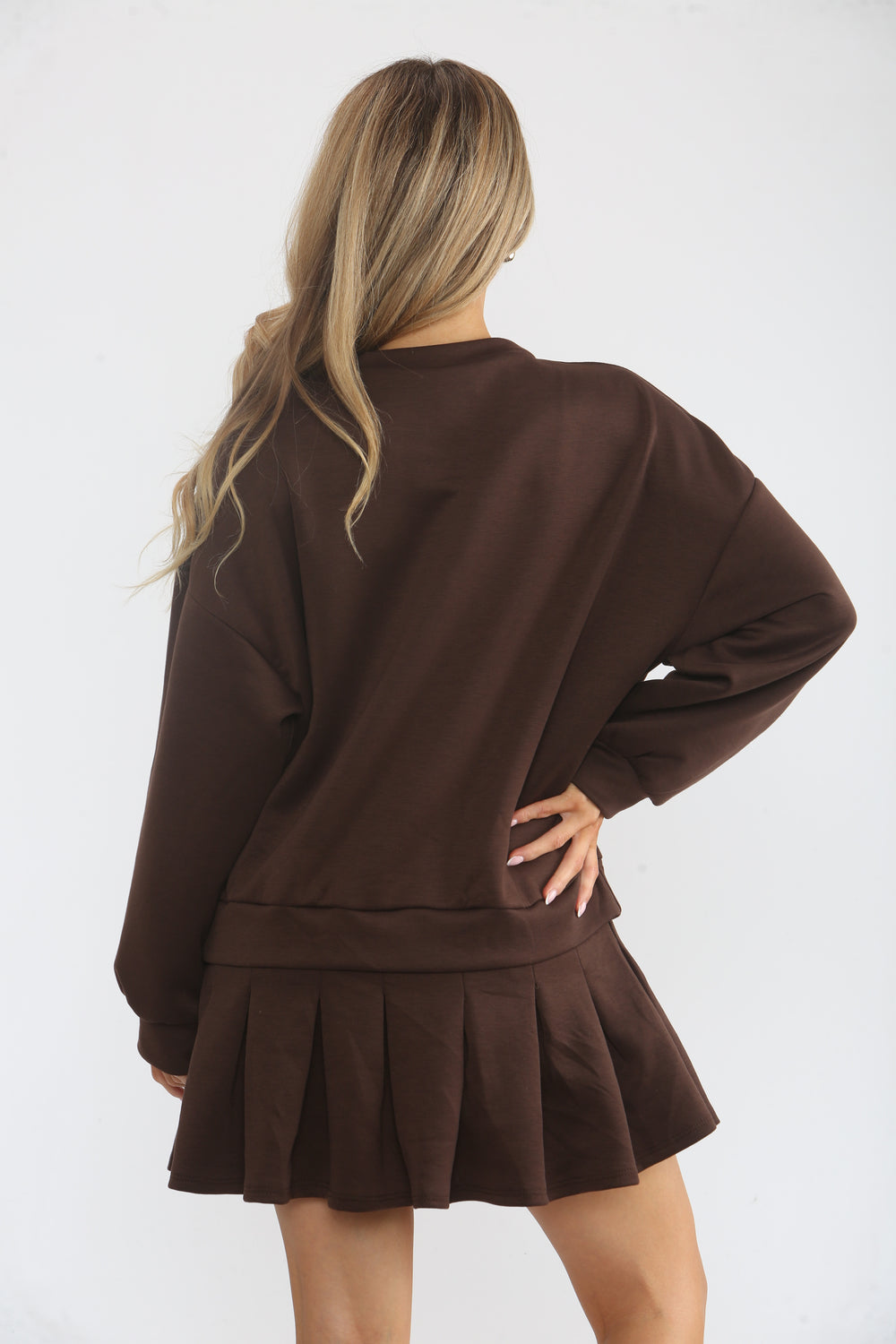 PLEATED BOTTOM JUMPER DRESS