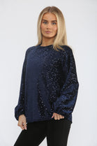 BOW BACK EMBELLISHED BLOUSE